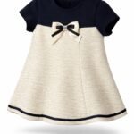 Φόρεμα άσπρο και μαύρο με φιόγκο